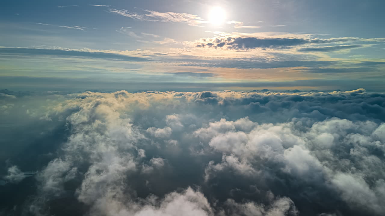 Sky only time lapse while flying through layers of clouds in the atmosphere - aerial cloudscape hyper lapse