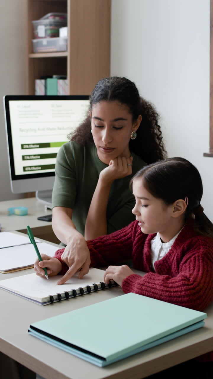 Teacher Tutoring a Young Student