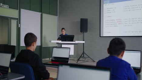 students learning coding in classroom