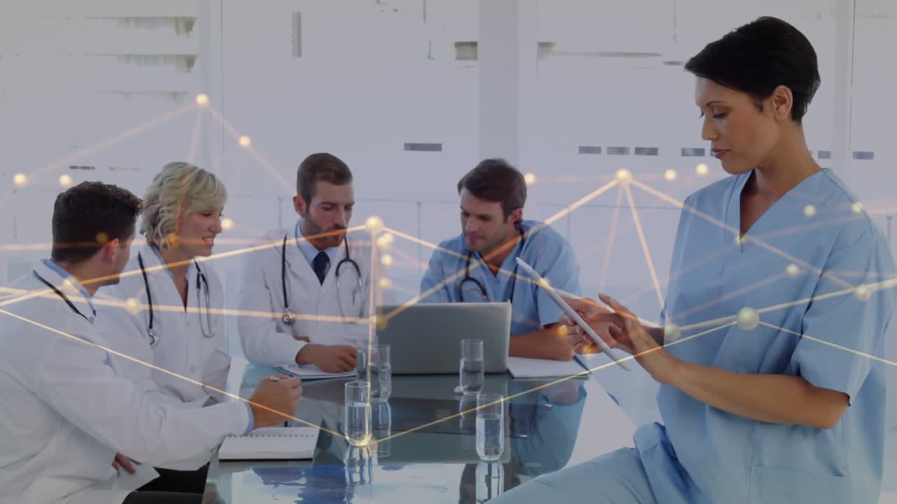 Medical team reviewing laptop right nurse tapping tablet causing animated moving nodes for review