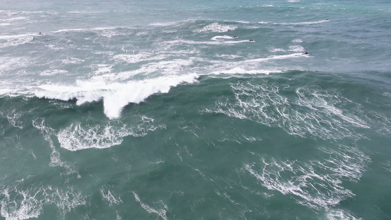 Nature power at famous iconic Nazaré, giant waves aerial drone shot