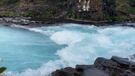 Powerful-turquoise-water-river-flowing-from-mountains