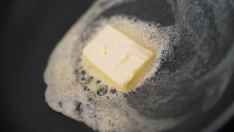 butter melting in a pan