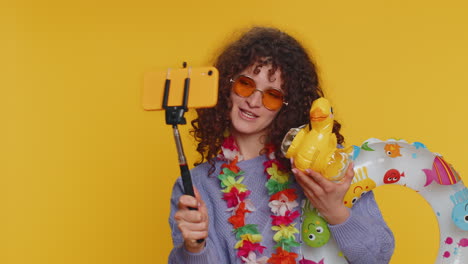 Traveler-blogger-tourist-woman-girl-in-sunglasses-taking-selfie-on-smartphone-record-make-video-call