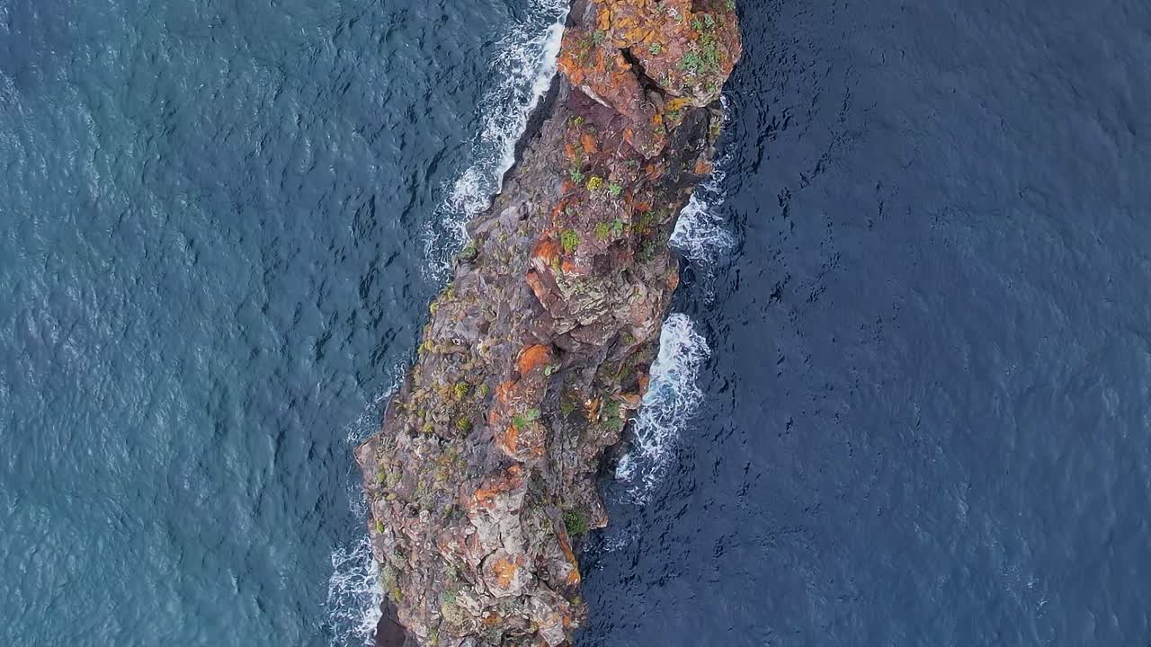 Explore stunning aerial views of rocky coastline in Madeira, Portugal