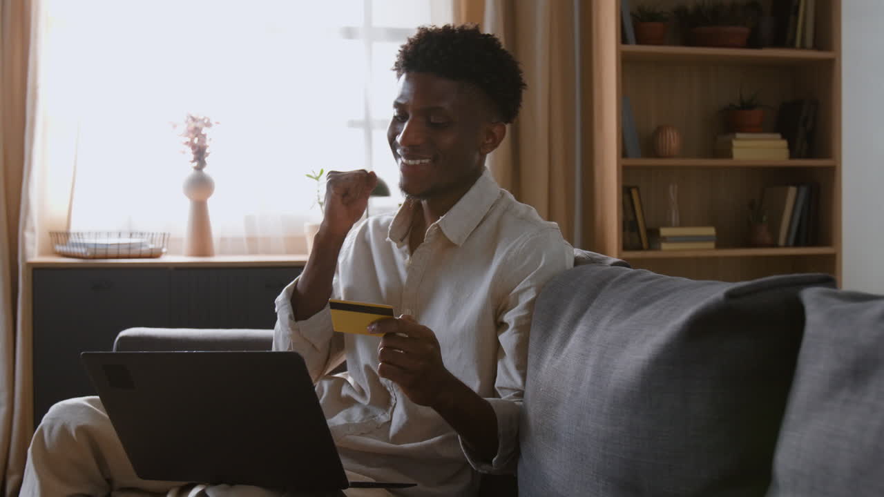 Man online shopping at home