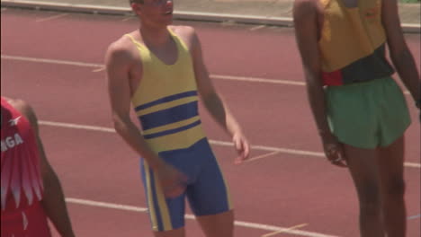 male runners prepare to race