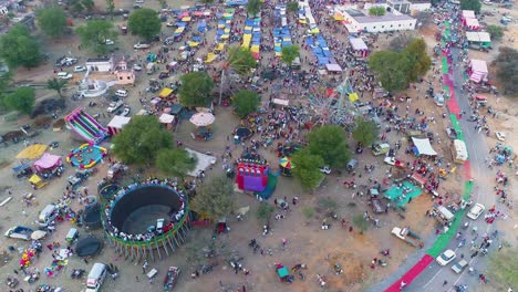 Aerial-view-of-fun-fair-in-the-outskirts-of-Jaipur-Rajasthan,-India