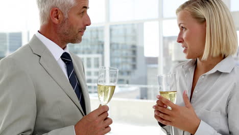 business partners celebrating with champagne