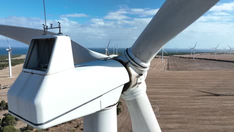 very close up shot of wind turbines spinning