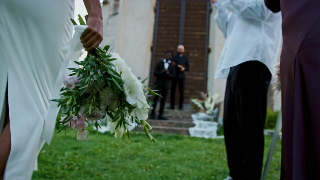 Wedding Ceremony with Bride Holding Bouquet