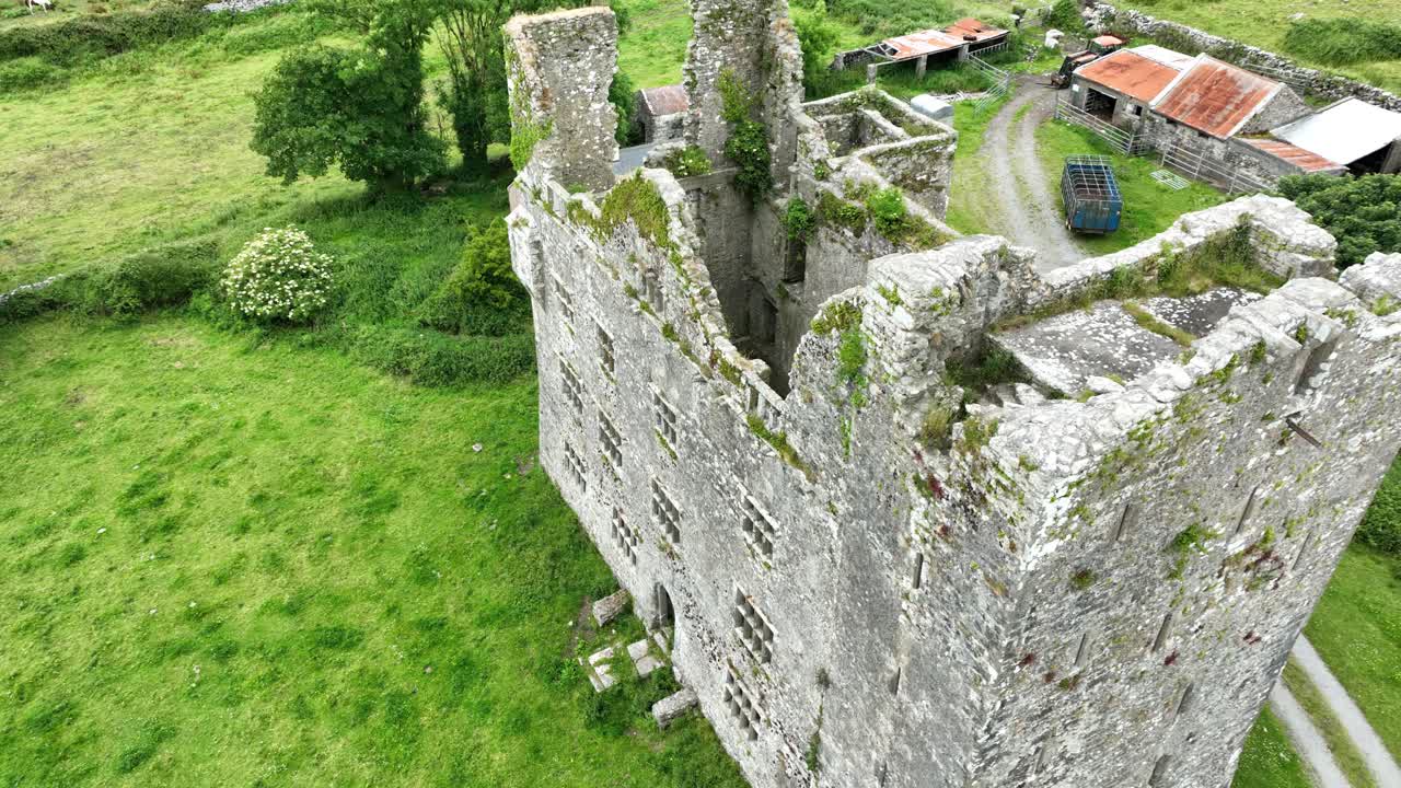Ireland Castles drone circling impressive Leamenah Castle popular tourist attraction in Co.Clare on the wild Atlantic way Epic Locations