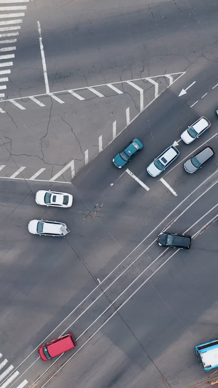 Aerial view of highway crossroads roads traffic an important infrastructure. Vertical video