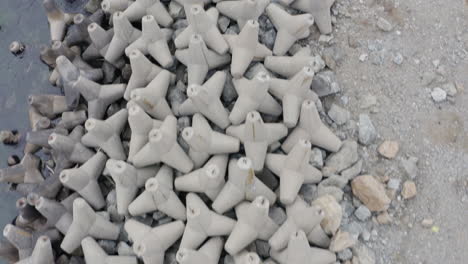 top view over a line of concrete wave breakers