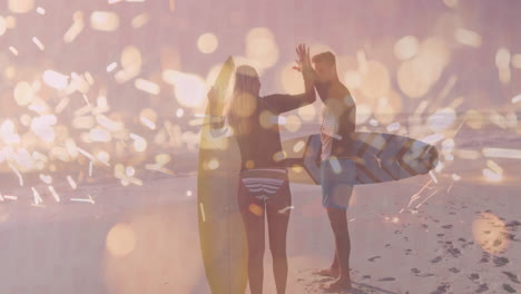 surfers on beach with boards, enjoying animation of sparkling light effects