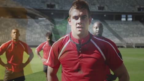 standing on field, rugby players in red jerseys with stadium in background