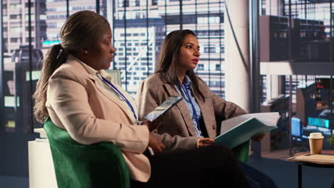 businesswomen in discussion