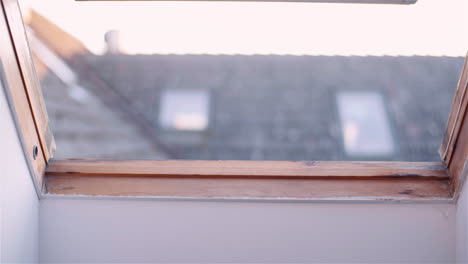 Close-Up of Closing Roof Window Before Storm
