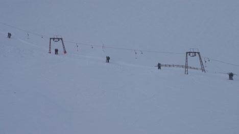 ws t-bar pulling people up hill