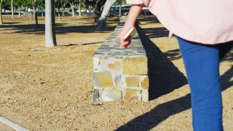 woman playing in the park 4k