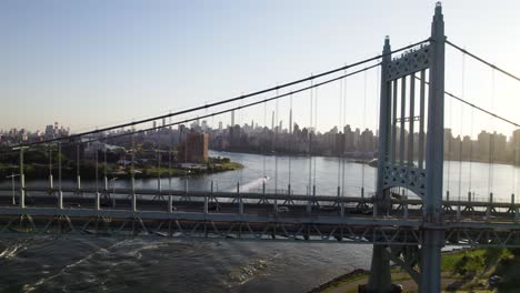nyc cars crossing between queens and manhattan along the triboro bridge