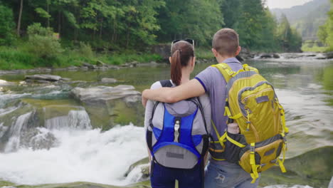 A-Beautiful-Waterfall-In-The-Mountains-Water-Flowing-Over-The-Rocks