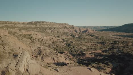 Aerial-approach-reveal-of-open-area-in-Canyon