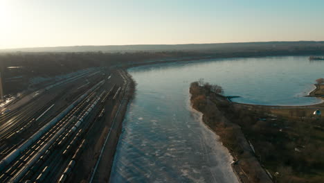 aerial shot of canal of water at sunset