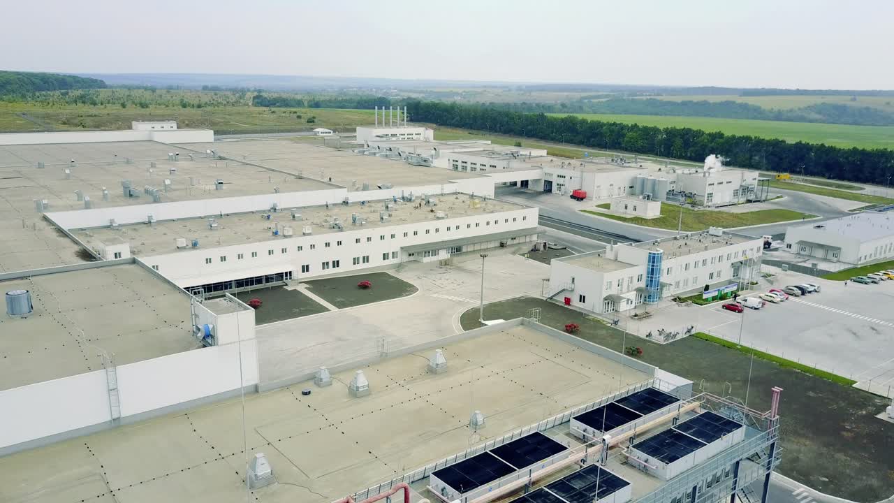 Modern Factory Exterior. Aerial view of newly constructed distribution center