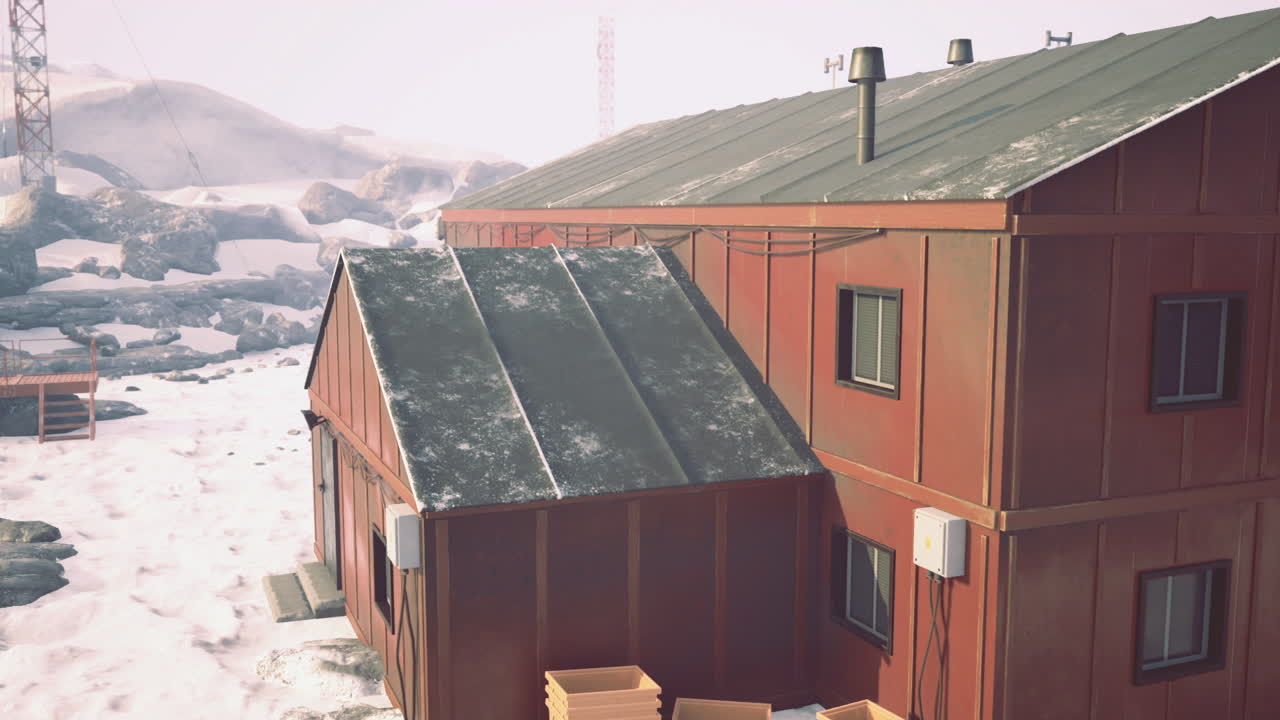 Chilly mountain settlement red wooden structures amid icy landscape