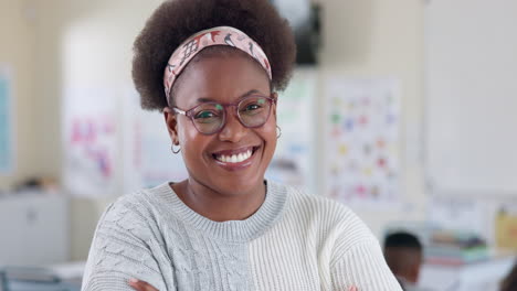 portrait of a smiling teacher in a classroom