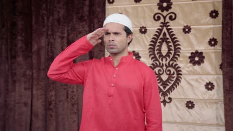 proud indian muslim man saluting