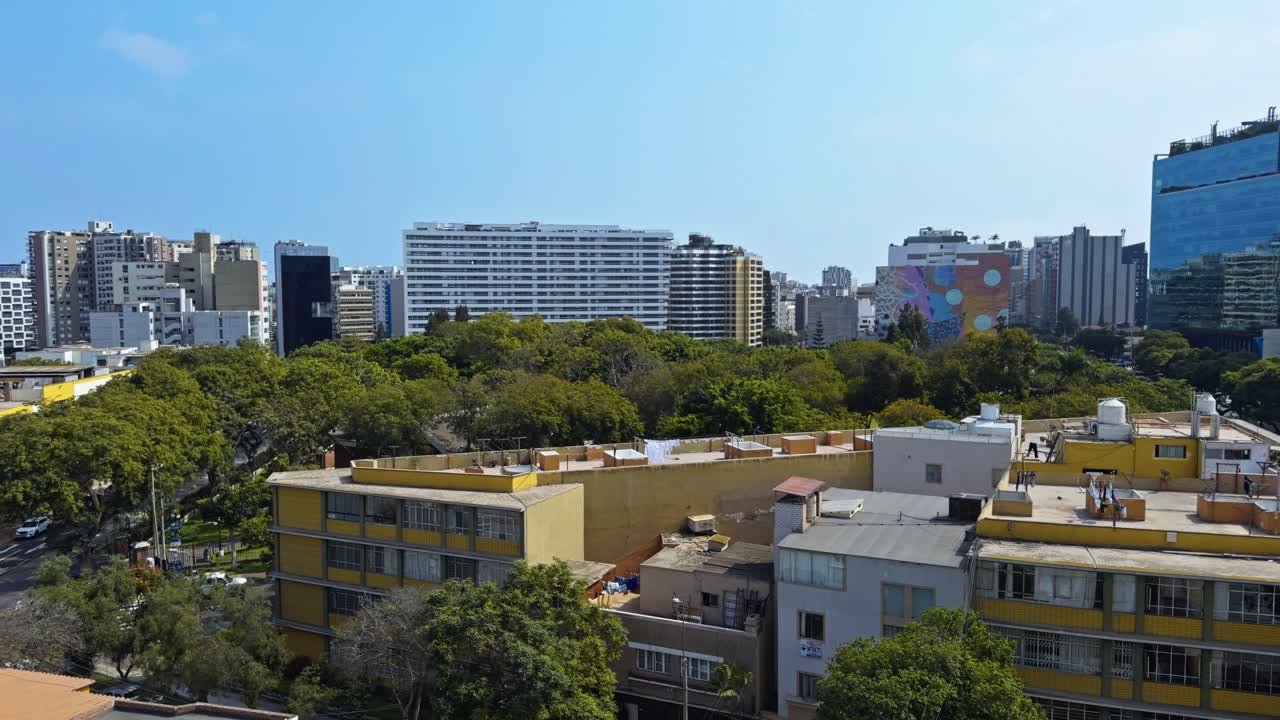 Barranco, lima with modern buildings and green areas visible, aerial view