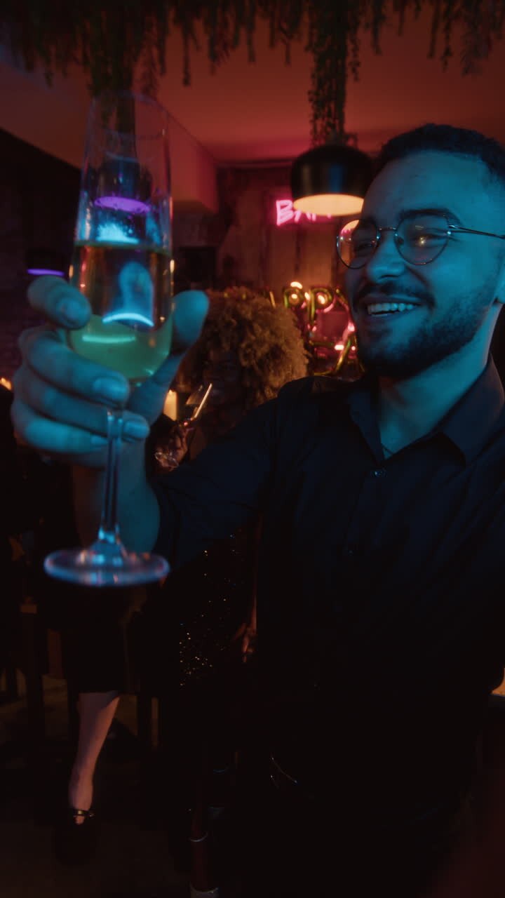 People celebrating and toasting with champagne at a party