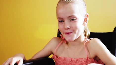 disabled school girl smiling in classroom at school