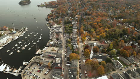 flying over downtown camden and harbor toward woodland by the coast