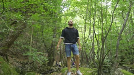 traveler young man walking in nature.