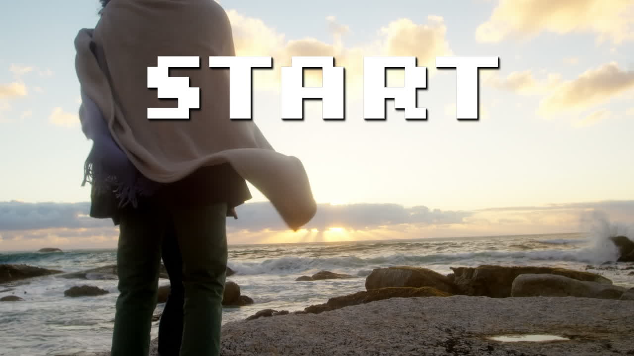 해변에서 아프리카계 미국인 부부 위의 시작 텍스트의 애니메이션