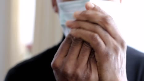 coronavirus man with spray fighting the disease on grey background stock video stock footage