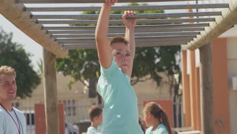 Caucasian-boy-training-at-boot-camp-