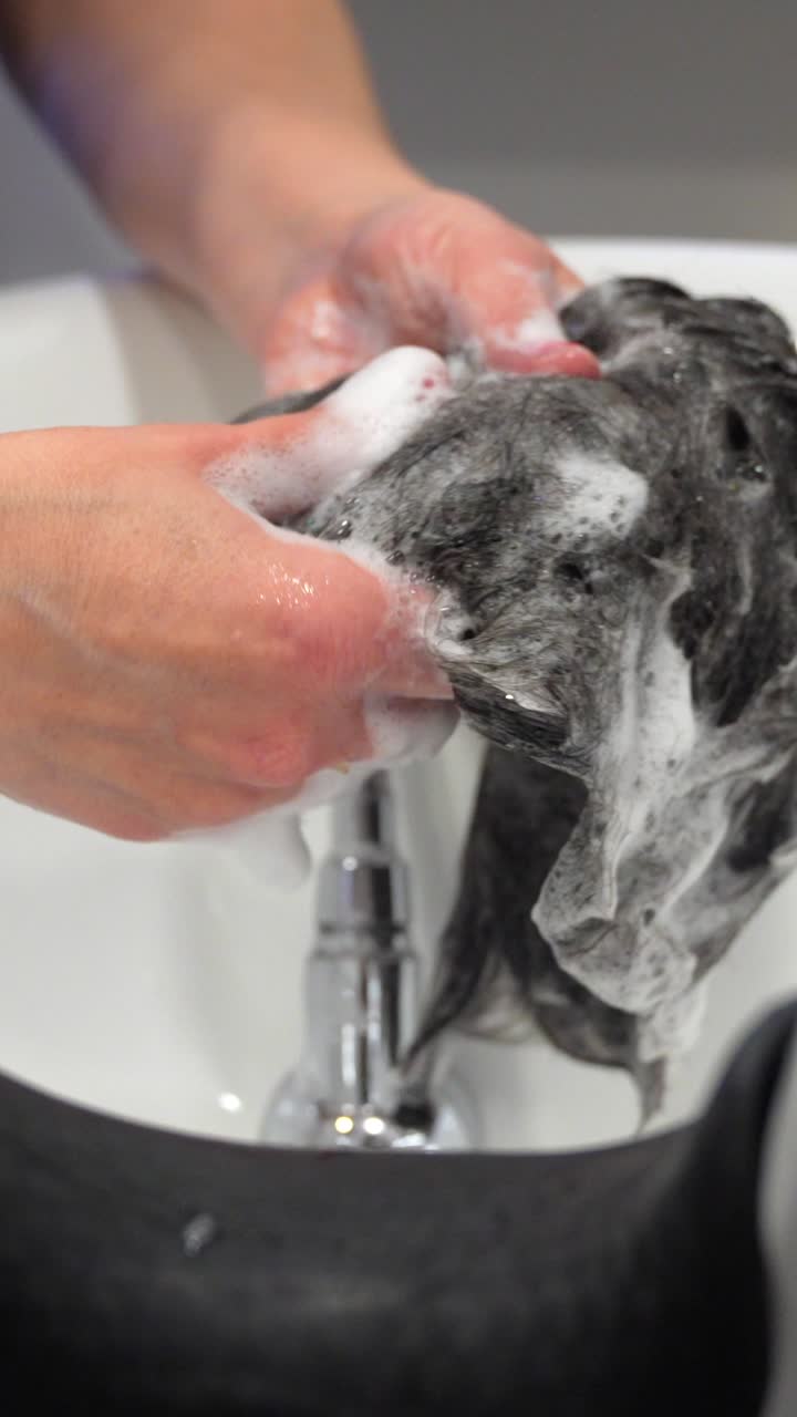 Washing hair in a sink
