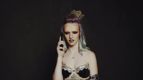 woman talking cellphone. young caucasian fashion woman talking on smart phone in studio