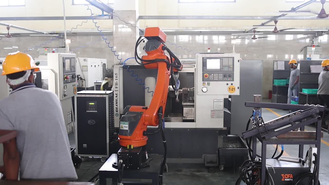 robotic arm moving a valve raw material part. Industry 5.0, industrial 4.0 concept
