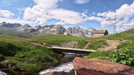 beautiful mountain creek flowing under a bridge for a hiking