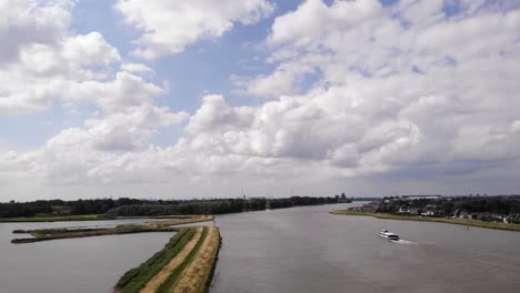 aerial view of river noord with fluffy clouds in the sky