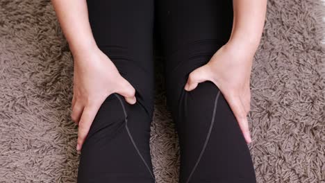 woman having knee pain the concept of preventing leg fatigue and self-massage