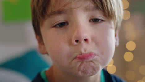 portrait sad little boy looking unhappy child at home