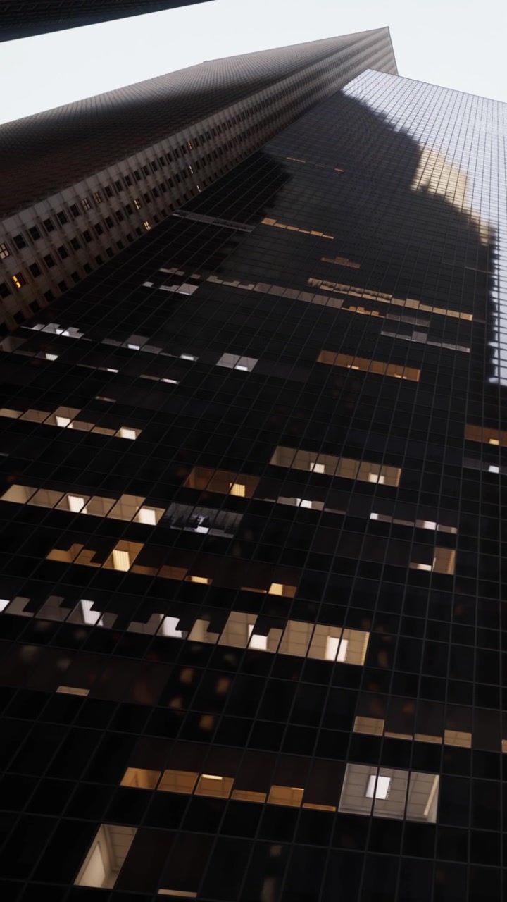 Building reflecting light and shadows in an urban area during the day