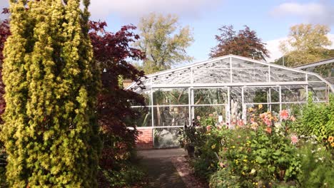 green house and colorful gardens at the botanic gardens in inverness, scotland in the highlands