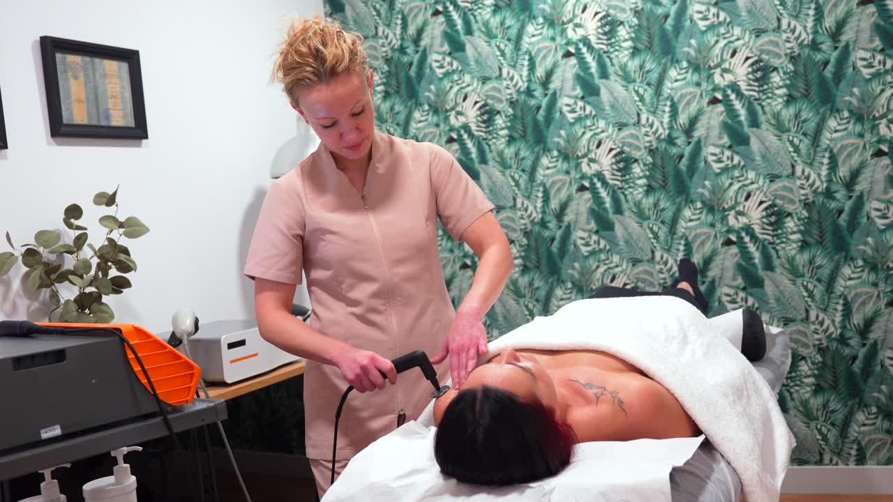 Woman receiving a beauty treatment at a spa